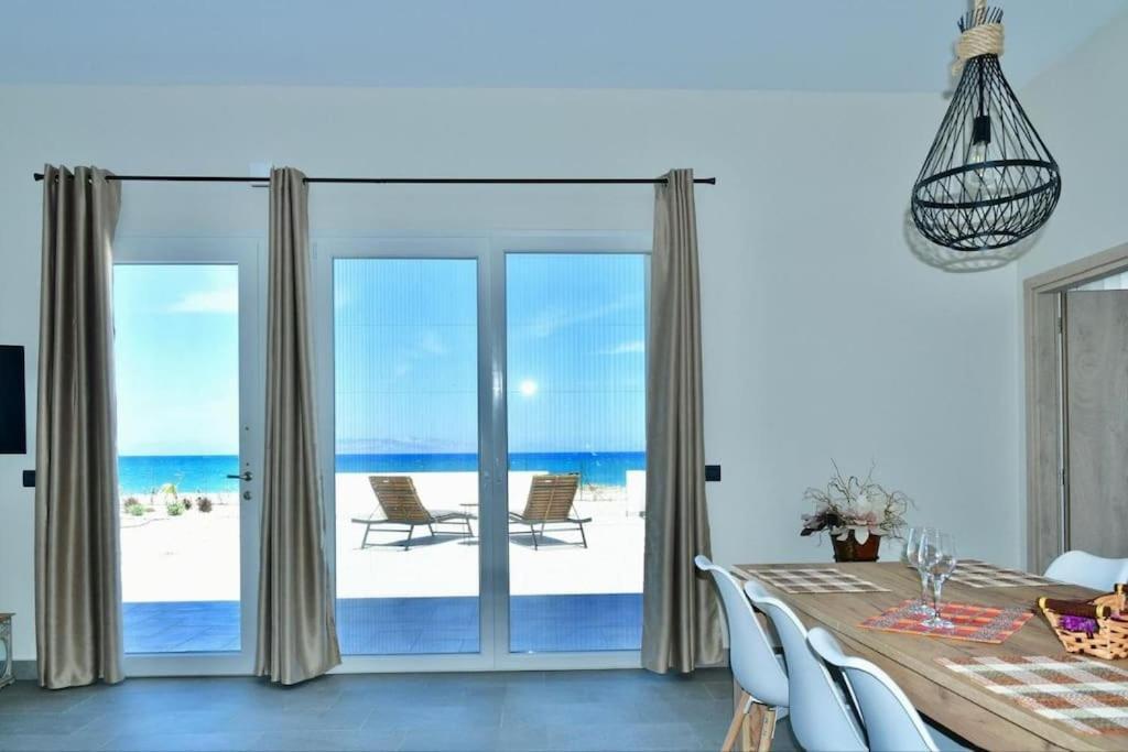 Lambou Beach Sunset Soroni Bagian luar foto